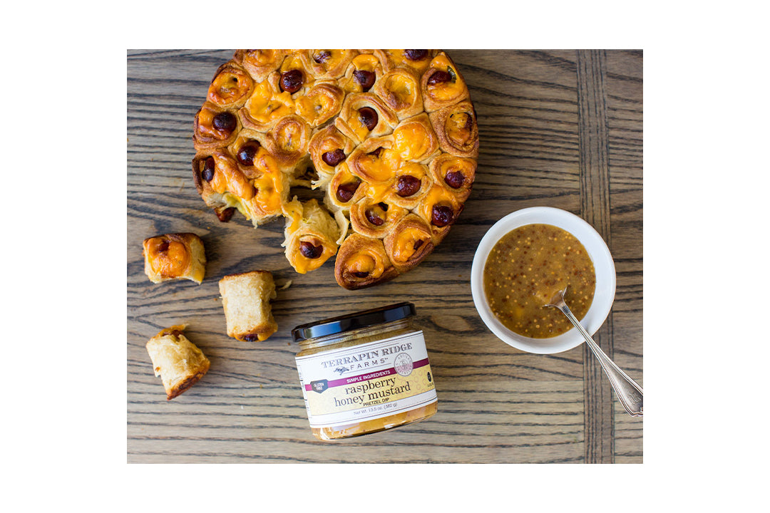 Cheesy Pigs in a Blanket Appetizer with Terrapin Ridge Farms Raspberry Honey Mustard Dip Cheesy Pigs in a Blanket Appetizer with Terrapin Ridge Farms Raspberry Honey Mustard Dip